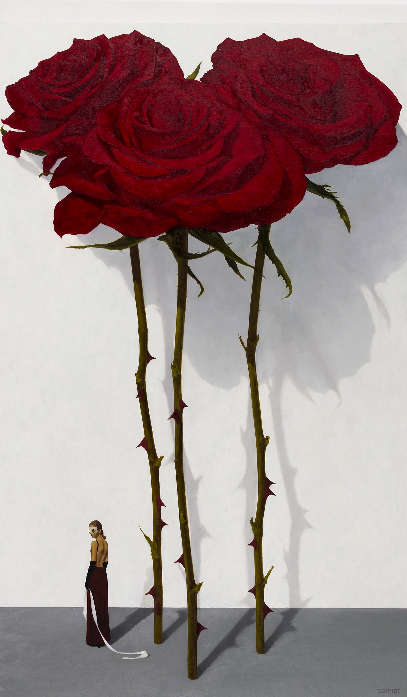 3 red roses with stems and thorns, shadows on white wall, diminutive female figure wearing a theatrical mask and holding a ribbon (Samantha)